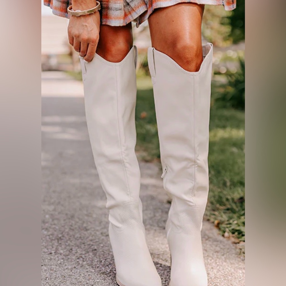 White knee high boots